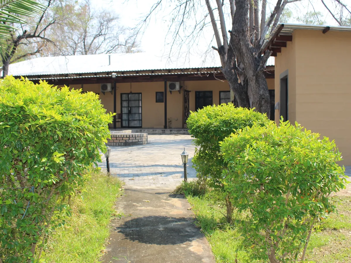 Lawns and walkway to the rooms