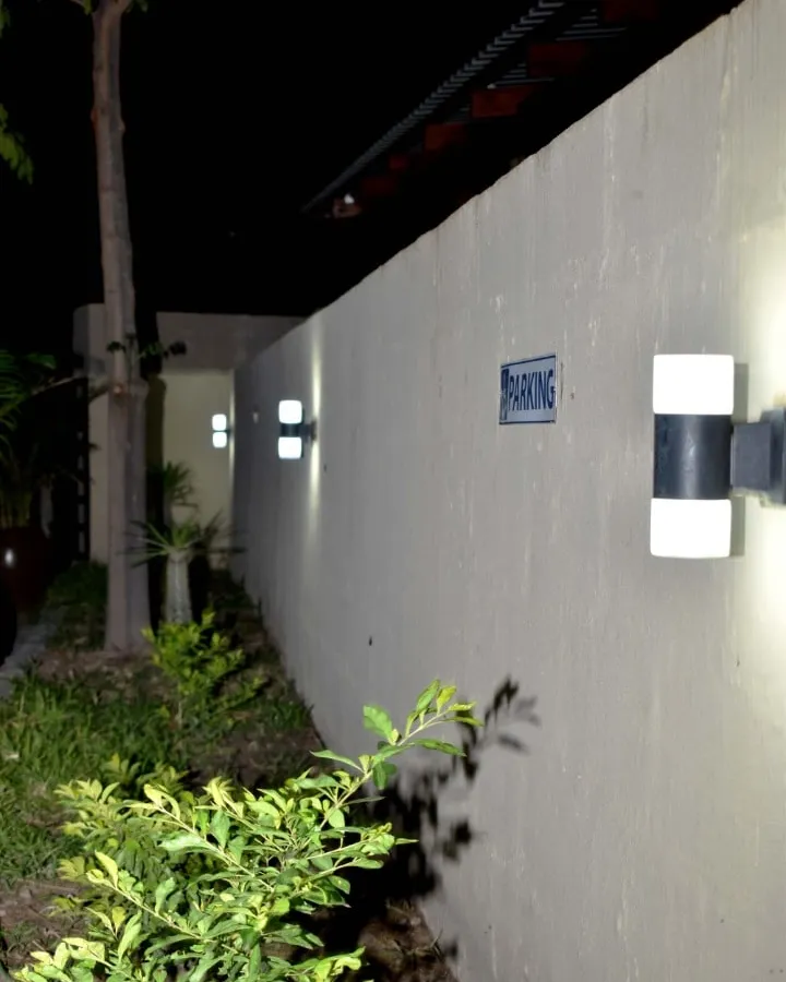 The lit parking wall after dark