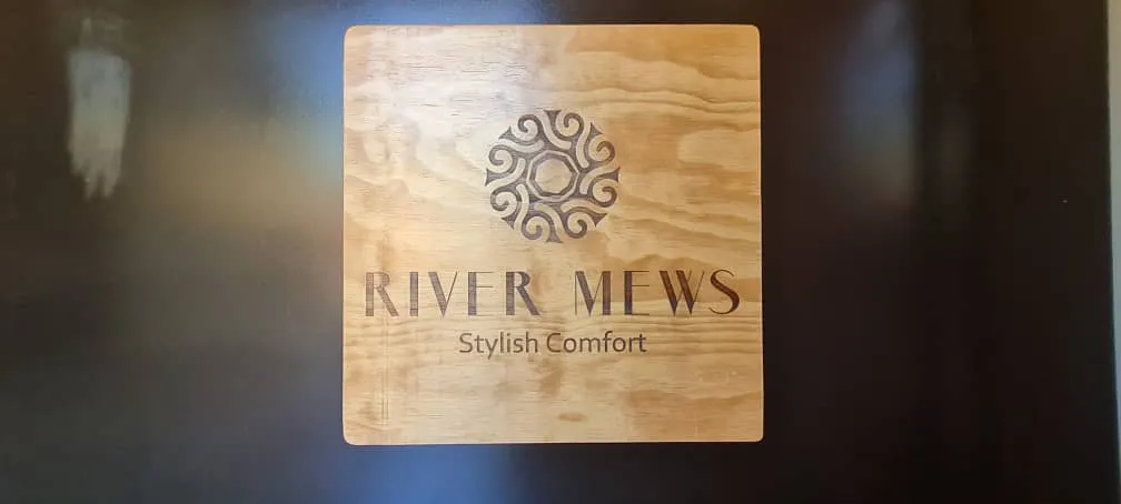 The Rivermews sign at the entrance